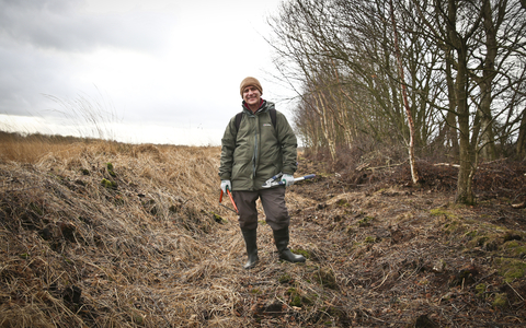 Tim standing in ditch