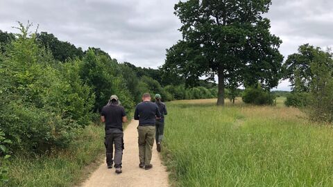 Men walking at Bay Meadows