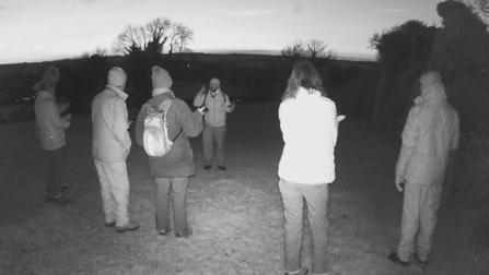 Gareth describes to the group the different sounds made by the different species.