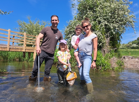A family pond dipping in the stream